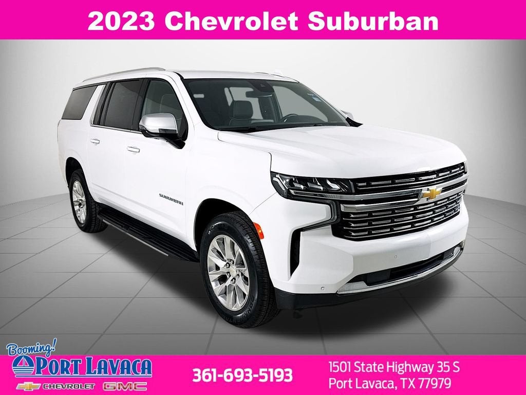 2023 Chevrolet Suburban Premier in Summit White — front three-quarter view
